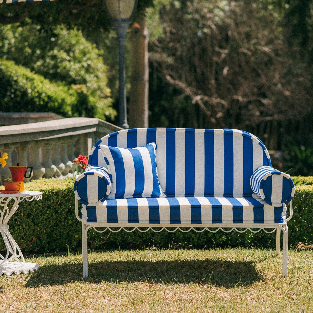 The Al Fresco Love Seat in Crew Mediterranean Blue Stripe | Antique White Frame - Image 5