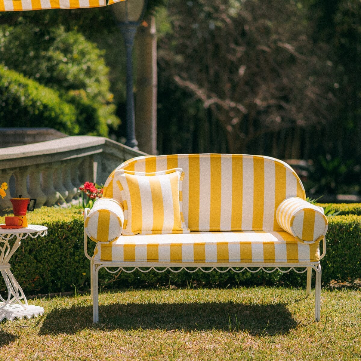 The Al Fresco Love Seat in Crew Mimosa Yellow Stripe | Antique White Frame - Image 2