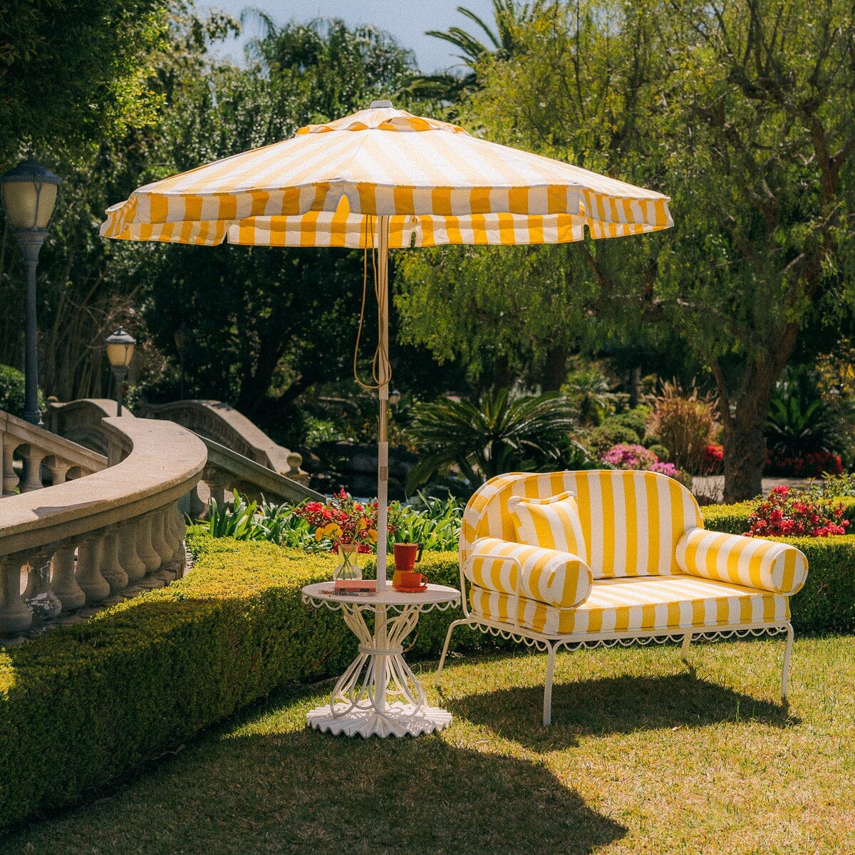 The Al Fresco Love Seat in Crew Mimosa Yellow Stripe | Antique White Frame - Image 5