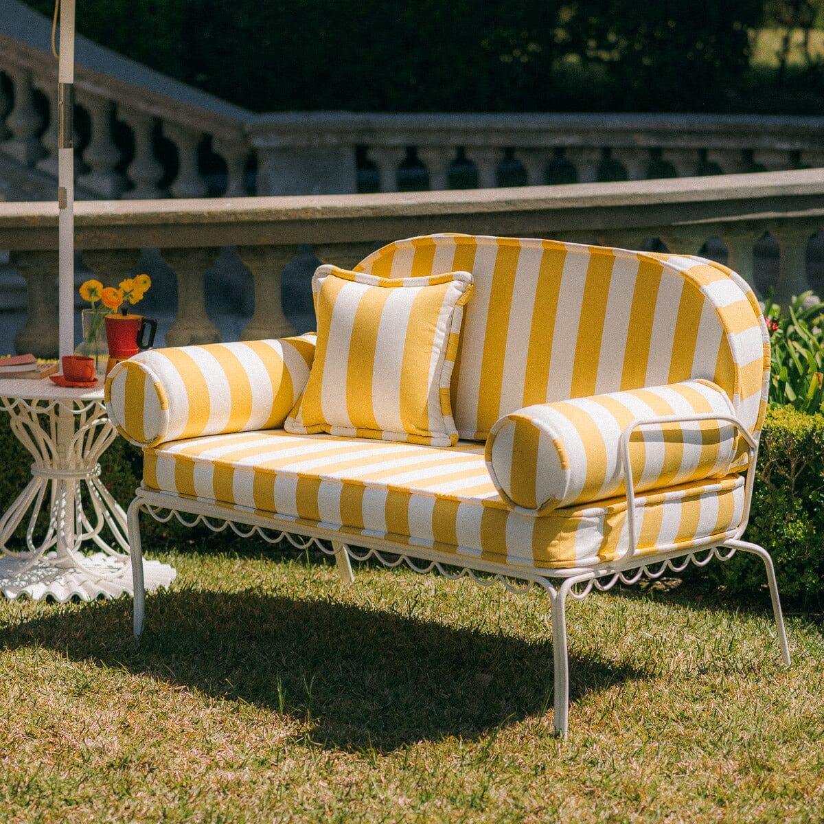 The Al Fresco Love Seat in Crew Mimosa Yellow Stripe | Antique White Frame - Image 6