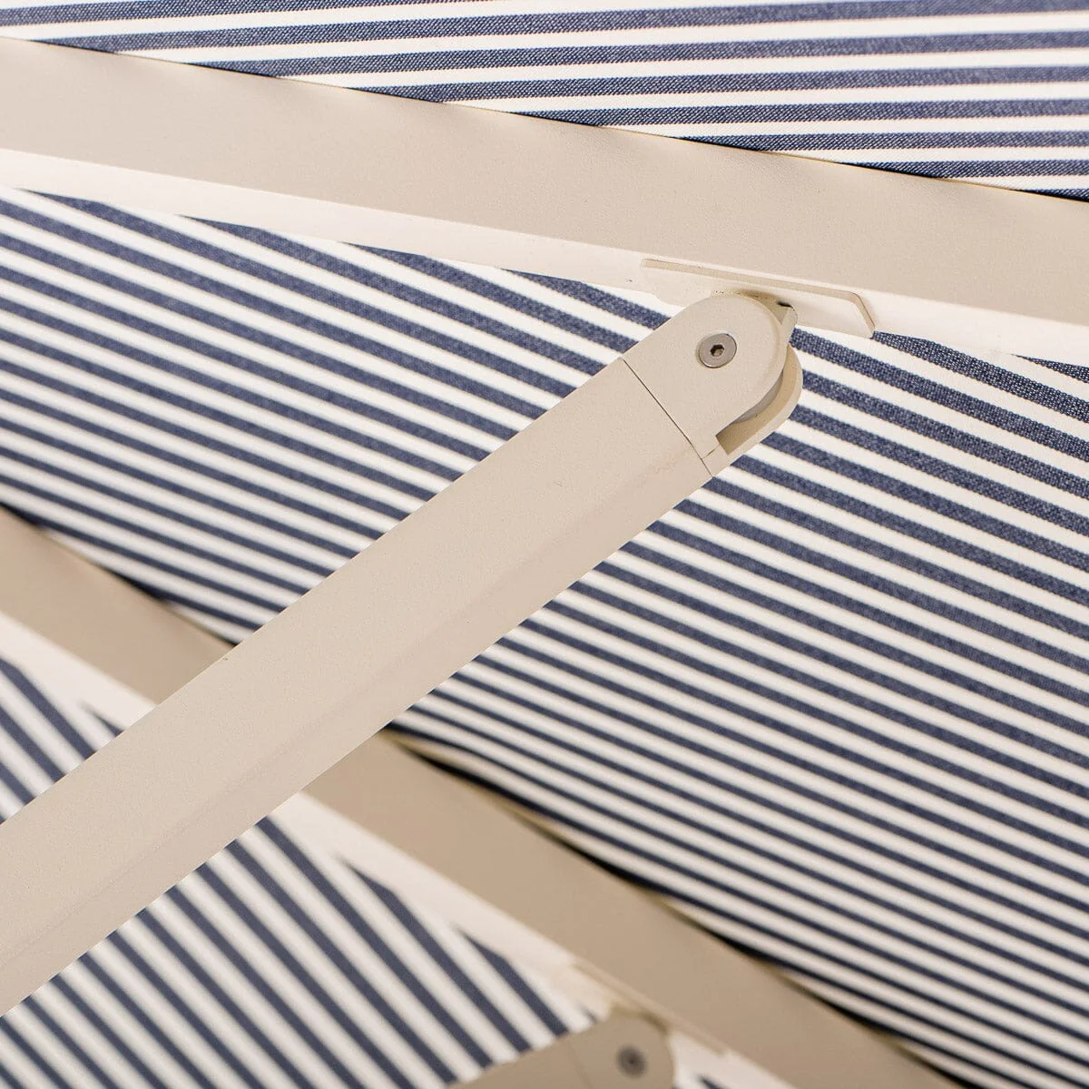 The Resort Market Umbrella in Lauren's Navy Stripe | 10' Antique White Frame - Image 10