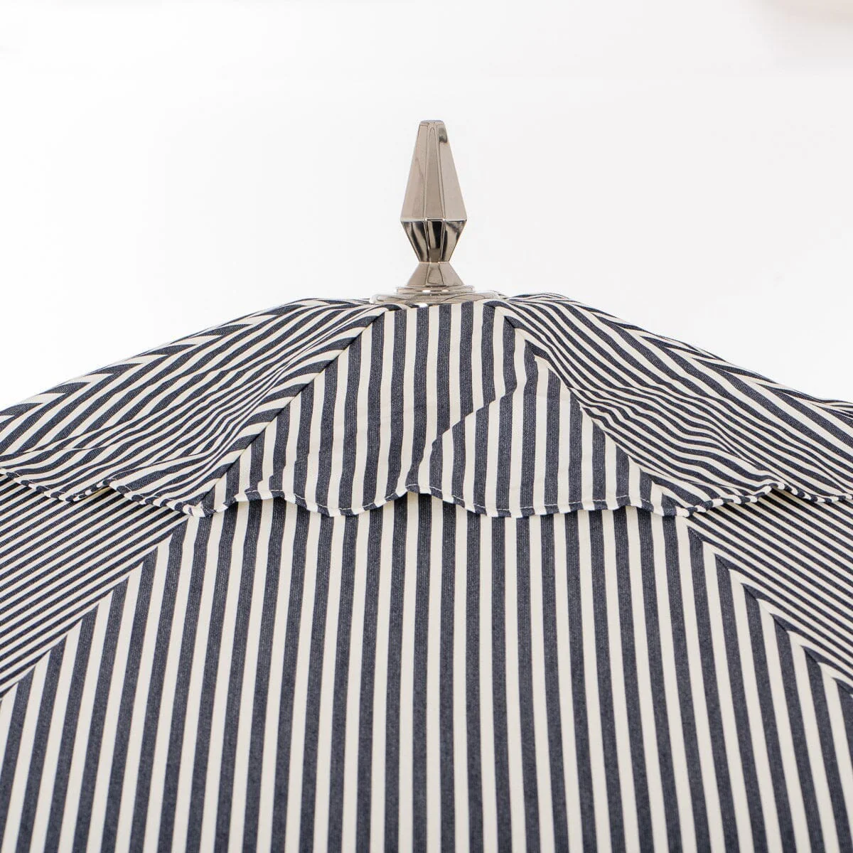 The Resort Market Umbrella in Lauren's Navy Stripe | 10' Antique White Frame - Image 4