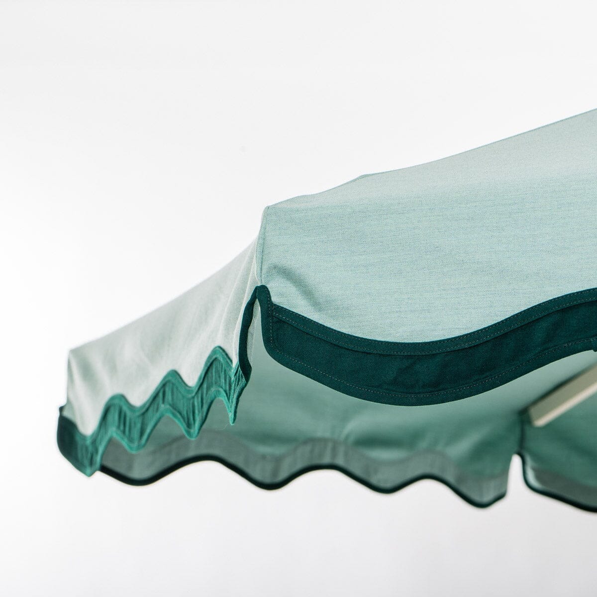 The Resort Market Umbrella in Rivie Green | 8' Antique White Frame - Image 6