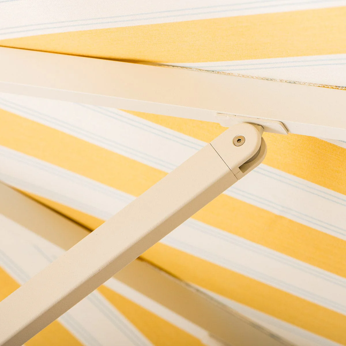 The Resort Market Umbrella in Tuuli Stripe Yellow | 10' Antique White Frame - Image 11