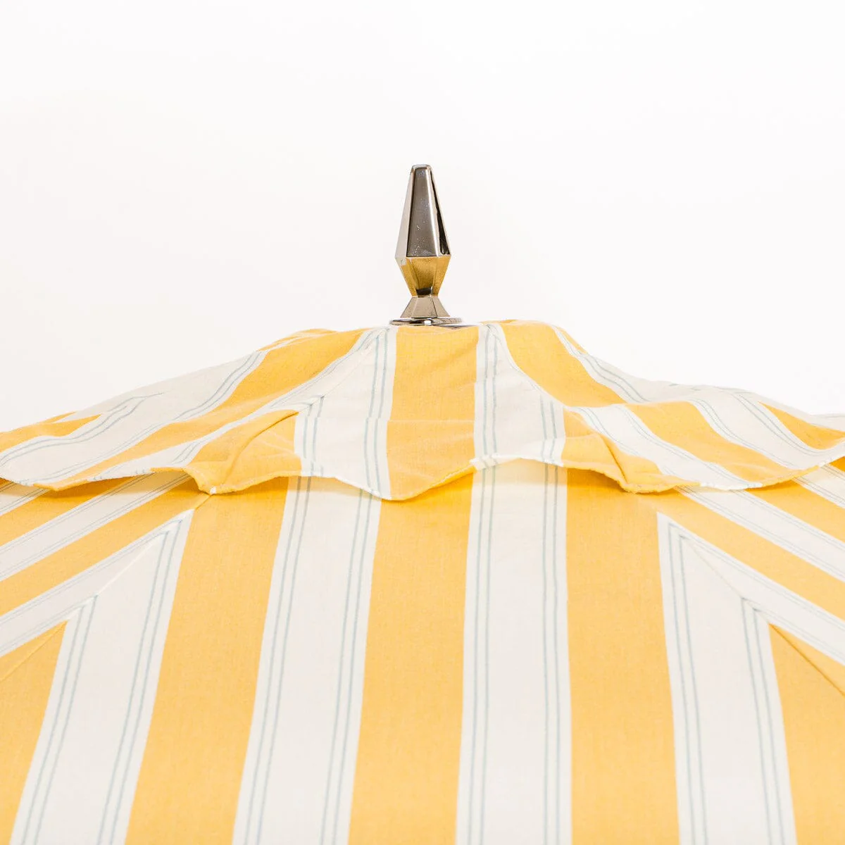The Resort Market Umbrella in Tuuli Stripe Yellow | 10' Antique White Frame - Image 5