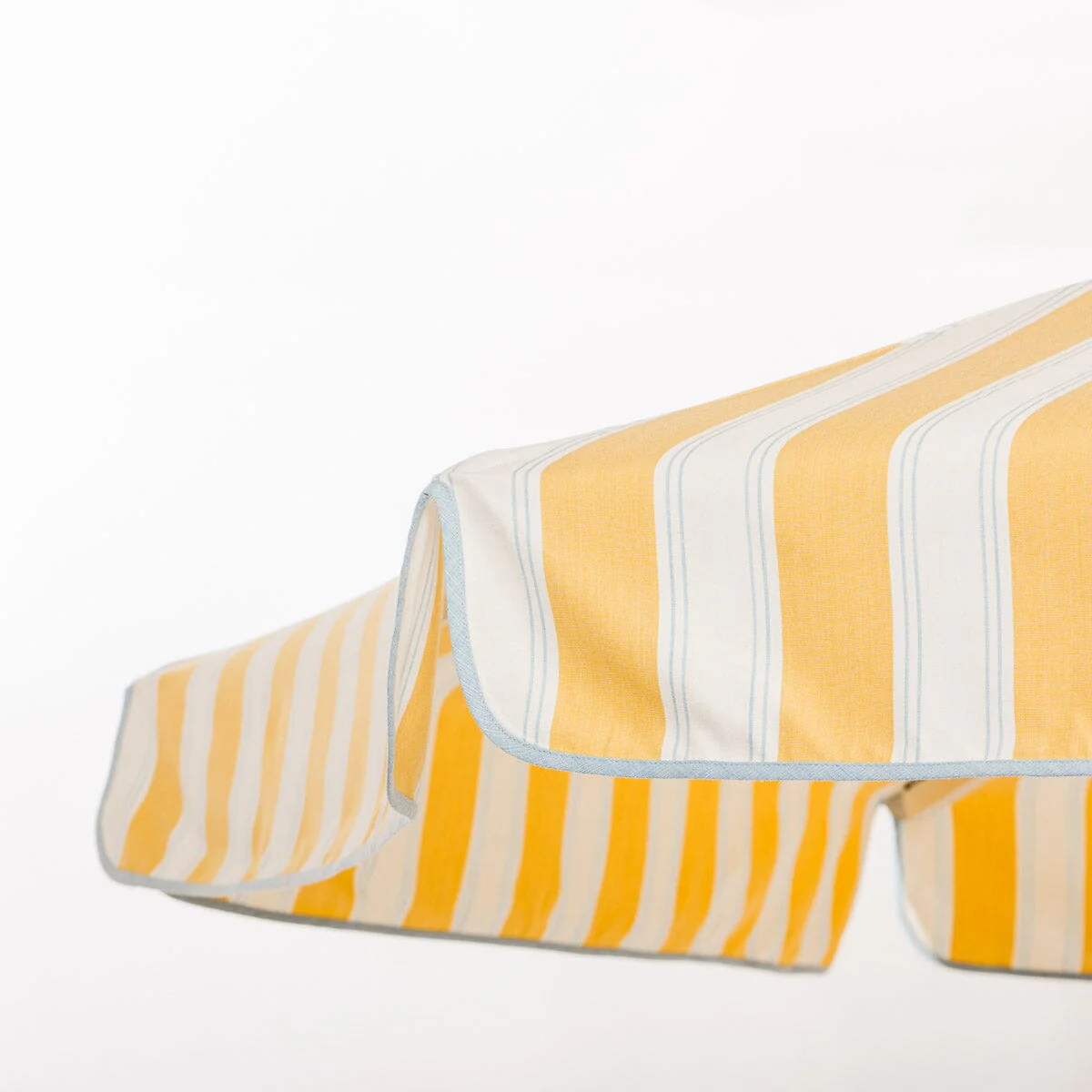 The Resort Market Umbrella in Tuuli Stripe Yellow | 10' Antique White Frame - Image 6